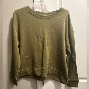 Olive green Dittos women’s relaxed sweatshirt.